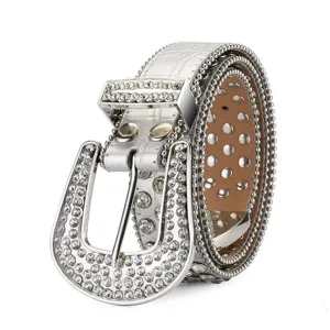 Western style silver belt featuring shimmering rhinestones and punk rivet studs