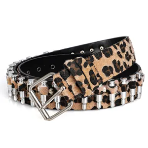 Detailed close-up view of leopard print belt with decorative silver bullet studs