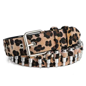 Detailed close-up of a punk leopard print belt featuring silver bullet-shaped metal rivets