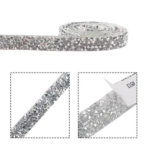 Close-up detail of silver resin rhinestone strip, sparkling diamond ribbon with adhesive.