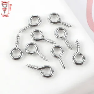 Pequeños cáncamos de rosca de metal plateado, ganchos para joyería DIY y accesorios.
