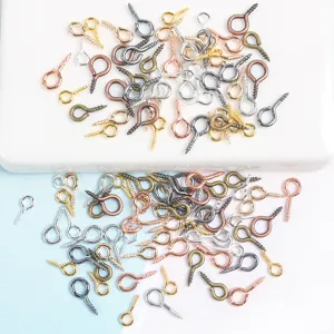 Mini metal eye pins screw hooks detail view for DIY jewelry making and pendant crafting.