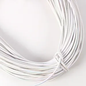 Macro view showing the texture of 5mm pearlescent white PU leather round cord for DIY crafts