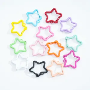 Set of colorful star-shaped painted metal snap hooks for DIY keychains and accessories