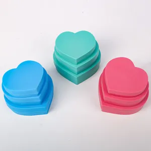 Stackable heart-shaped sorting trays for diamond painting DIY kits in blue, teal, and pink.