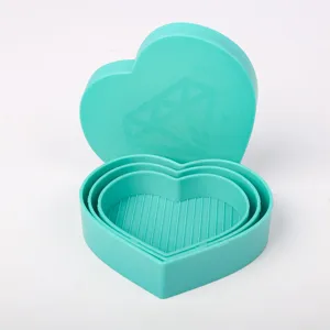 Close-up of heart-shaped nesting trays for diamond painting DIY craft
