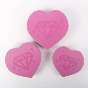Three pink heart-shaped trays for diamond painting DIY tool set accessories detail view