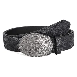 Detail view of western cowboy belt with embossed peony patterns and carved metal buckle