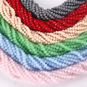 Close-up detail of colorful faceted rondelle glass beads for DIY jewelry and bracelet making