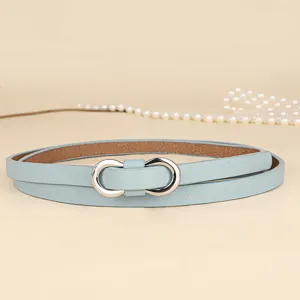 Detailed view of light blue leather skinny belt with a stylish silver figure-eight buckle.
