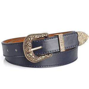 Detailed view of a vintage navy blue leather belt with ornate gold engraved metal buckle.