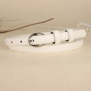 Elegant close-up view of a slim white leather belt with a sleek silver buckle for women