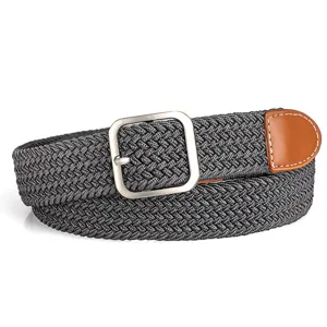 Close-up detail of the dark grey braided elastic belt featuring a silver square pin buckle.