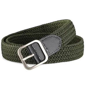 Close-up of army green woven elastic belt with metallic buckle and leather detail.