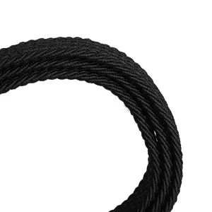 Close-up detail of black stretch woven belt texture, showing elastic fabric and tight weave.