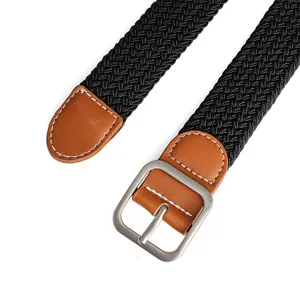 Black woven elastic belt detail with brown PU leather ends and silver pin buckle for daily wear.