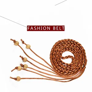 Elegant women's brown braided thin waist belt with decorative wooden beads for dresses