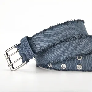 Distressed canvas belt with double grommets and metal pin buckle for casual everyday wear.
