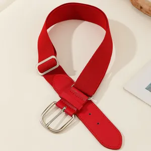 Close-up view of red elastic baseball belt with silver buckle and PU leather detail