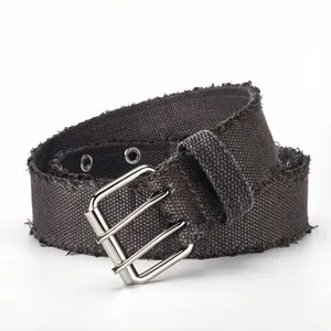 Distressed canvas belt with metal double-prong buckle and frayed edge details for casual wear.