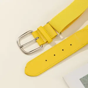 Close-up of bright yellow elastic belt with silver metal buckle and PU leather tip