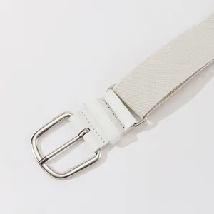 Close-up of white elastic woven belt with silver metal buckle and PU leather detail