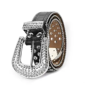 Punk style black leather belt with silver rhinestone studs and a large crystal buckle