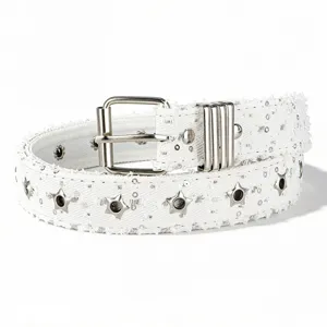 White denim punk belt detail showing metal star eyelets and silver buckle hardware.