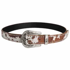 Western cow print rhinestone belt with ornate silver buckle and sparkling studs for stylish jeans.