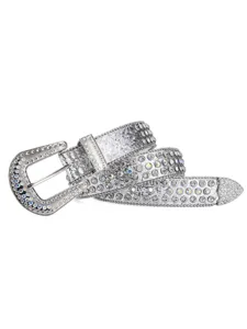 Close-up of sparkling rhinestone studded western belt with ornate metal buckle and details.