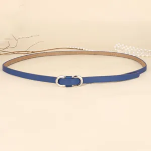 Close-up of a slim blue leather belt with a polished silver-tone double ring buckle