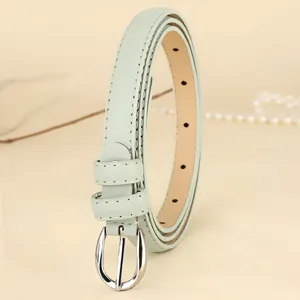 Elegant slim mint green leather belt for women with polished silver buckle detail