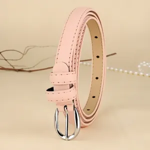 Detailed view of an elegant pink slim leather belt for women featuring a silver buckle