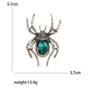 Vintage spider brooch with green rhinestone and dimensions for Halloween costume decor