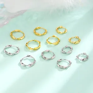 Orecchini a cerchio Mobius intrecciati minimalisti in oro e argento ideali per coppie