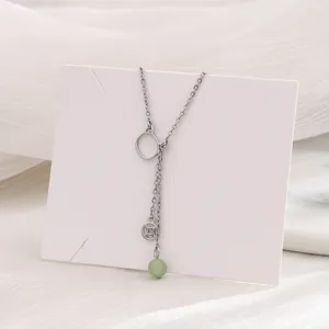 Collana gatto argento con perla di giada verde e pendente a moneta di rame