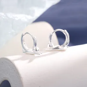Creative matte silver cat hoop earrings featuring a cute stretching kitten silhouette