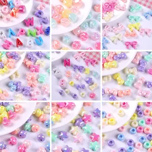 Assorted colorful AB coated acrylic beads in various shapes for DIY jewelry making crafts