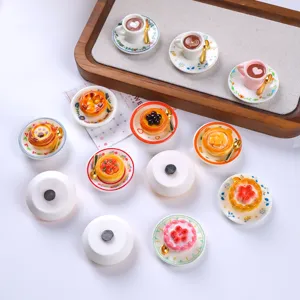 Detailed view of various miniature resin food fridge magnets with magnetic backing
