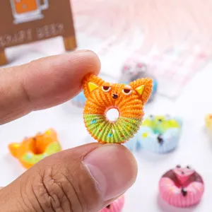 Miniature fox-shaped donut resin charm for DIY hair accessories and shoe charms.