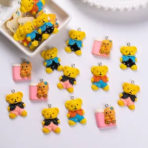 Close-up of colorful resin cartoon teddy bear charms for DIY jewelry making
