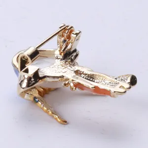 Detailed back view showing the secure gold-plated pin mechanism of a cartoon girl brooch.