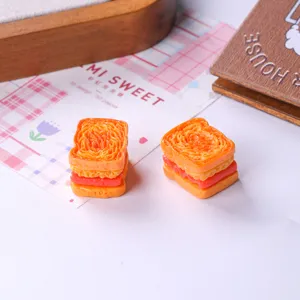 Detailed macro view of realistic miniature resin toast sandwich models for dollhouse DIY crafts