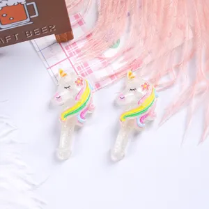 Glitter resin unicorn magic wand DIY accessories for hair clips and phone cases.