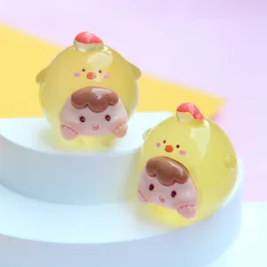 Macro detail of cute jelly-colored luminous cartoon bird ornament for DIY keychain