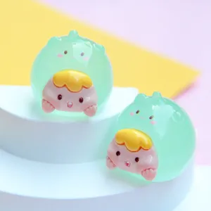 Close-up of cute luminous jelly color cartoon girl figurines on white display stand.