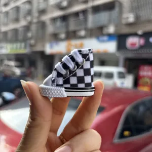 Mini 3.5cm black and white checkerboard canvas doll shoe keychain detail view