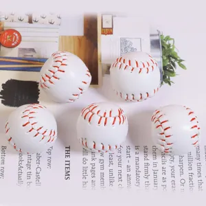 Macro detail of five mini white baseball accessories with vibrant red hand-stitching.