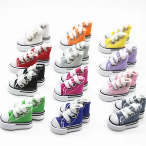 Detail shot of 3.5cm miniature canvas sneakers for dolls in various colors