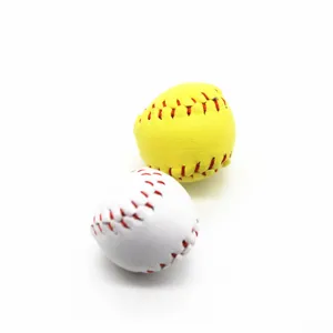 Macro detail of mini baseball and softball accessories with realistic red stitching